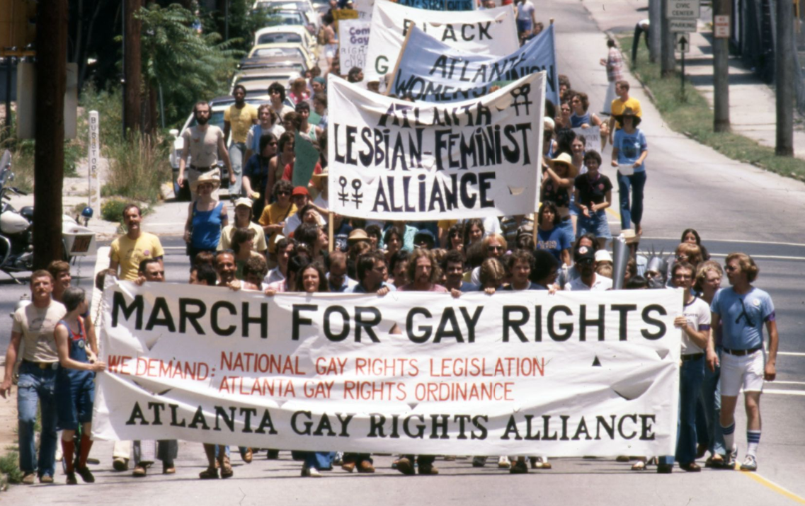 Atlanta Gay Rights Alliance and others leading the Pride parade through Atlanta, 1977